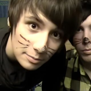 two young men with their faces painted to look like cats Dan And Phil Halloween 2009 Dan And Phil Young, Dan And Phil Catboy, Dan And Phil Cat Ears, dark slate gray