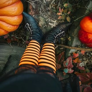 a person wearing black and orange striped socks, with their feet in the ground next to pumpkins Happy Halloween Stockings Halloween Knee-high Stockings, Witches Brew, Halloween Night, dark slate gray