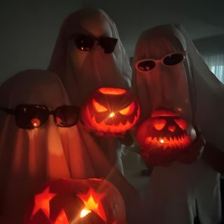 three people dressed up in halloween costumes with glowing pumpkins on their heads and sunglasses Trio Halloween Holiday Halloween, Aesthetic Halloween Pics, Halloween Aesthetic Photos, black