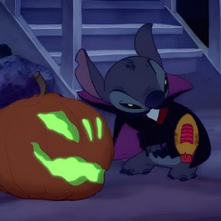a cartoon mouse with a glowing pumpkin on the ground Halloween Stitch Gif dark slate gray