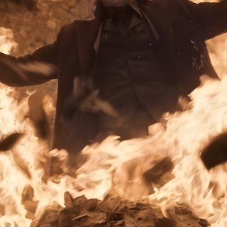 a man standing in front of a bunch of fire with his arms spread wide open Juvea Halloween 4k saddle brown