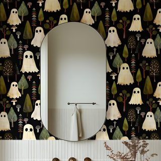 a bathroom sink sitting under a mirror in front of a wallpaper covered with owls Halloween Themed Bathroom Ghost Mural, Spooky For Bathroom, Ghost For Walls, dim gray