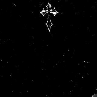 an artistic black and white photo of clouds with a cross in the sky at night Halloween Cross black