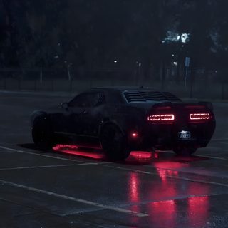 a black sports car is parked in the rain Halloween Hellcat Hellcat Headlight, Hellcat In Rain, Hellcat Drifting, Hellcat At Night, Demon Hellcat, black