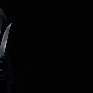 a person in a black hooded suit holding a knife Halloween Black Background For Computer, Black Pc, Ghostface Desktop, Hacker Logo, Ghostface Laptop,