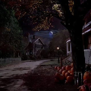 pumpkins are lined up on the side of a road at night in front of a house Halloweentown Aesthetic Vintage Halloween Art, 90s Halloween, Graffiti Iphone, black