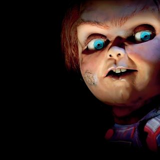 a creepy looking doll with blue eyes in the dark Halloween Chucky Chucky Ipad, Chucky Black Background, Chucky Evil Smile, Chucky In The Dark,