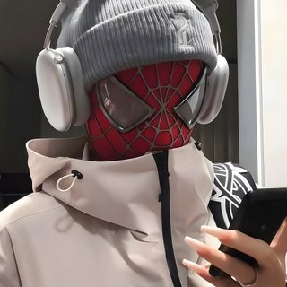 a person with headphones and a jacket on holding a cell phone in their hand Halloween Iphone For Boys Spider Headphones, Spiderman Selfies, Streetwear Spiderman, gray