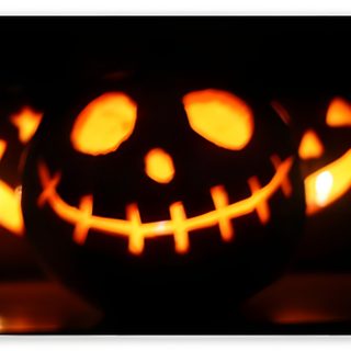 an image of a carved pumpkin with glowing eyes and mouth marks on it's face Dual Monitor Halloween Facebook Cover Photos Halloween, Halloween Facebook Cover, Halloween Fb Covers, black