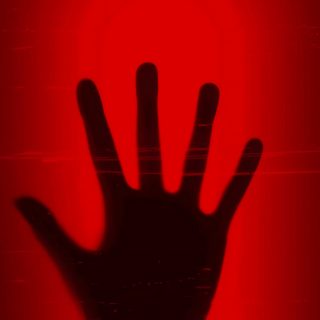a hand is silhouetted against a red background with the shadow of a person's hand Halloween Red Halloween Red Background, Wallcraft Live, Dark Mao, Suspense Story, Iphone Live Gif, maroon