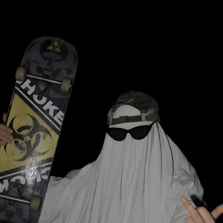 a man dressed as a nun holding a skateboard in one hand and making the peace sign Halloween Middle Finger black