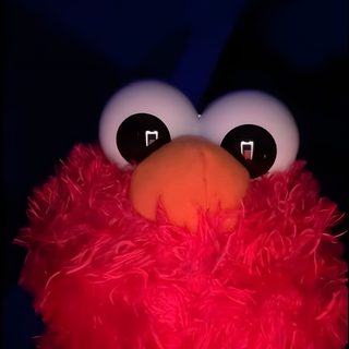 a red stuffed animal with big eyes and large black eyes on it's face Elmo Halloween Red Tiktok, Old Cookie Monster, Cute Elmo Pfp, Aesthetic Elmo, Elmo Pfps, Tiktok, black