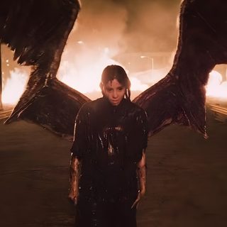 a man with wings standing in front of a fire Halloween Billie Eilish Billie Eilish Outfits, Famous Stars, Cutie Patootie, Jon Snow, Favorite Person, black
