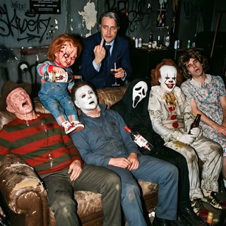 a group of people sitting around each other with clowns painted on their faces and mouths Halloween Costumes dark slate gray