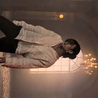 a woman in white shirt and black pants flying through the air with her legs spread out Hyunjin Halloween Hyunjin 1920x1080, Idol Background, Skz Computer, Hyunjin Karma, dark olive green