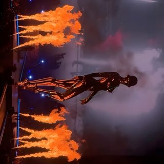 a man is flying through the air on fire The Weeknd Halloween The Weeknd, Instagram, dark slate gray