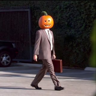a man in a suit walks down the street with a pumpkin on his head Dwight Halloween Dwight Pumpkin Head, Threat Level Midnight, The Office Show, Hoodie Weather, black