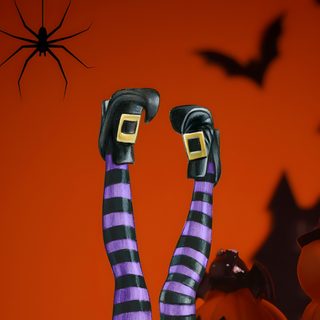 the legs and feet of a person in striped socks with their hands up against an orange background Happy Halloween Stockings Lock Screen, Halloween Art, Phone Backgrounds, Halloween, maroon