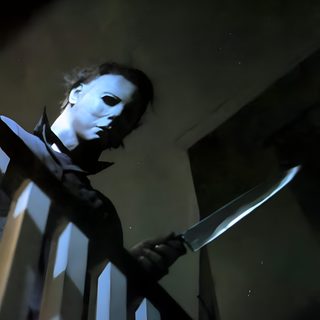 a man holding a knife in his hand while standing next to a stair railing at night Halloween 1978 Iphone Michael Myers Aesthetic, Halloween Michael Myers Aesthetic, Michael Myers Lockscreen, black