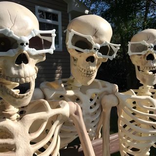 three skeleton statues sitting on a bench in front of a house with their eyes closed Trio Halloween 3 Skeletons, Skeleton Friends, Three Skeletons, Trio Skeleton, 6 Skeleton Friends, dim gray