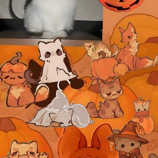 a collage of halloween pictures with cats and pumpkins in the background, along with an image of a cat wearing a bat Cute Halloween With Cats chocolate