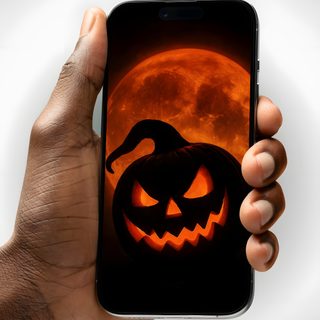 a hand holding an iphone with a halloween pumpkin on it and the moon in the background Modern Smartphone With Halloween Desktop, Phone, Halloween, Mobile, Dark, Tattoo You, rosy brown
