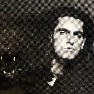 a black and white photo of a man with long hair next to a large animal Type O Negative And Pantera On Halloween Peter Steele Pc, Type O Negative Pfp, Peter Steele 90s, dark slate gray