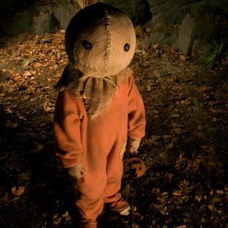 black and white photograph of a teddy bear in the woods with leaves on the ground Halloween Sam Sam Trick R Treat Movie Images, Trick R Treat Characters, Trick R Treat Film, black
