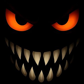 an evil face with glowing orange eyes in the dark, looking like it has teeth Halloween Face Holographic, Mickey Mouse, Scary Faces, Beautiful Landscape, Landscape, Nature Aesthetic, black