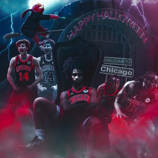 the chicago bulls basketball team is posing for a photo in front of a giant sign that says happy halloween Halloween Nba dark slate gray