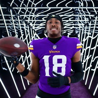 a man holding a football in his right hand and wearing a purple jersey with the number 18 on it Justin Jefferson Halloween Justin Jefferson Pc, Justin Jefferson Vikings Griddy, Minnesota Vikings Justin Jefferson Gif, black