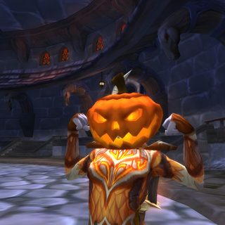 an animated character dressed as a pumpkin in a dark room with stone floors and walls World Of Warcraft Halloween Halloween Video Game, World Of Warcraft, Pumpkin Carving, dark slate gray