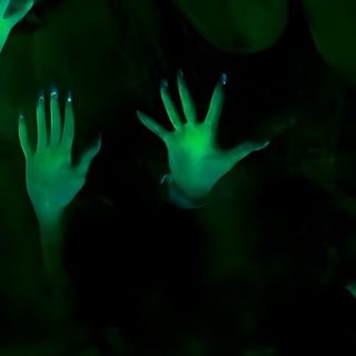 two hands are glowing in the dark with green glowers on their fingers and arms Scary Halloween Gif Animation Background, Moving Backgrounds, Moving, Cinematic Lighting, Live Screen, black