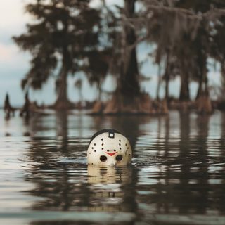 a white ball floating on top of a body of water next to trees in the background Camp Crystal Lake Halloween Summer Ween, Spooky Photos, Horror Iphone, Horror Pics, dark olive green