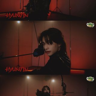 an image of a woman holding a bow in her hands Hyunjin Halloween black