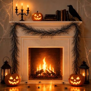 a fireplace decorated for halloween with pumpkins and candles Halloween Fireplace Staircase Decor Ideas, Battery Candles, Staircase Decor, Halloween Garland, saddle brown