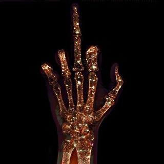 a lighted hand is in the dark with its fingers spread out and lights are shining on it Halloween Middle Finger Gold Grunge Aesthetic, Glitter Skeleton, Gold Skeleton Aesthetic, black