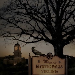 a large tree sitting on the side of a road next to a sign that reads mystic falls virginia Halloween Iphone Movies And Shows The Vampire Diaries 3, Vintage, Vampire Diaries Seasons, dark slate gray