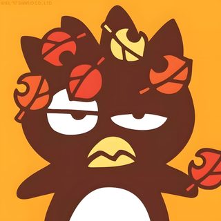 an angry looking penguin with leaves on its head and eyeballs in his ears, Badtz Maru Halloween Autumn Themed Party Decor, Badtz Maru Fall Theme, Fall Season Greeting Card, chocolate