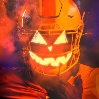 a football player wearing an orange and yellow helmet with glowing pumpkins on it's face Halloween Football Justin Jefferson Halloween, Vols Football Logo, Background Fire Nfl Sick Football, brown