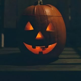 a carved pumpkin sitting on top of a wooden table with the words soon written above it Halloween Is Coming Halloween Pumpkin Captions, Jack O Lantern Quotes, Halloween Quote With Jack-o'-lantern, black