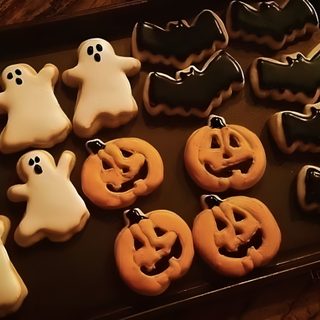 decorated cookies in the shape of ghost and pumpkins Halloween Cookie Spooky Cookies, Fall Board, Fall Room Ideas, Homemade Peanut Butter Cups, black