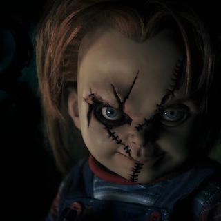 a creepy looking doll with red hair and blue eyes is shown in a dark room Halloween Chucky Chucky Doll Scary, Chucky Scary, Chucky With Red Eyes, Evil Chucky, Creepy Chucky, black