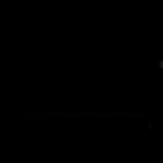 a black cat sitting in the dark with glowing eyes Desktop Black Cat Halloween Animals,