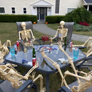 a group of skeleton sitting around a glass table with drinks on it in front of a house Halloween Skeleton Party Funny Dp, Artsy Background, Boys Covering Face, dim gray