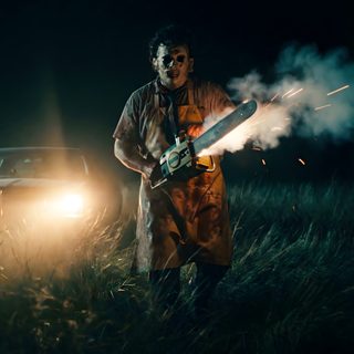 a man in an orange raincoat holding a fire extinguisher next to a car Horror Halloween Iphone With A Person Leather Face, Horror Photography, Scary Tattoos, black