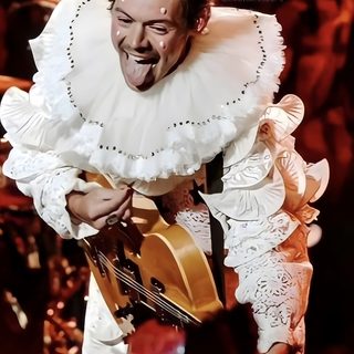 a man that is holding a guitar in his right hand and wearing a white dress Harry Styles Happy Halloween Iphone One Direction Halloween, Harry Styles In Costume, Harry Styles Clown, maroon