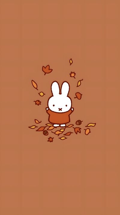 an animal with leaves flying around it Miffy Halloween Autumn Aesthetic Cartoon, Bear, Cute Home Screens, Screen, Cute Fall Bunny, Cute Cartoon, peru