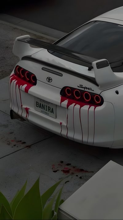 a white toyota sports car with blood on the hood and tail lights is parked in front of a building Halloween Car Supra Aesthetic Iphone, Is That A Supra, Supra Aesthetic, dark slate gray