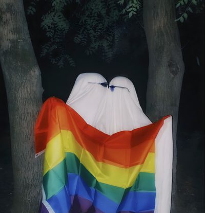 there is a white ghost wrapped in a rainbow colored blanket next to some trees at night Gay Halloween Gay Ghost Costume, Bi Ghost, Rainbow Ghost Costume, Gay Halloween, Pride Ghost, dark slate gray
